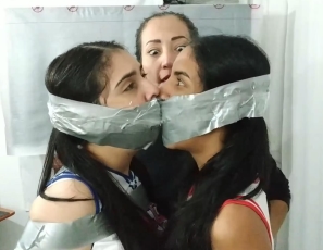 Tied Up Cheerleader Rivals United in a Tape Gagged Kiss